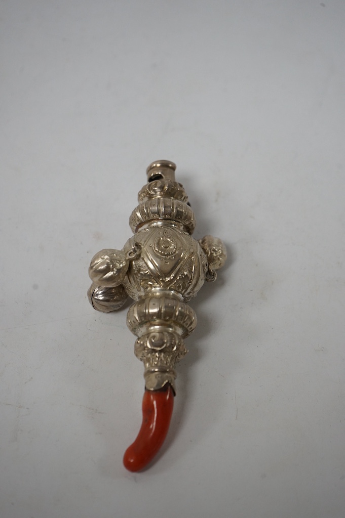 A Victorian silver child's rattle, with three bells, whistle and coral teether, Colen Hewer Cheshire, Birmingham, 1879, 10cm. Condition - good